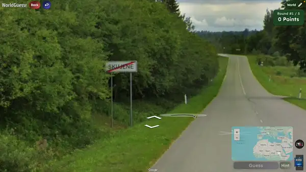 Studying a road sign for clues in WorldGuessr